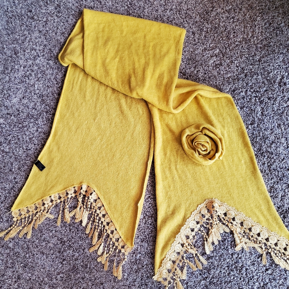 Mustard colored scarf with flower detail and embroidered edges. Very pretty.